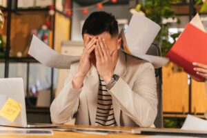 japanese businessman exhausted office stress evening (Photo by AI25.Studio AI GENERATIVE via Pexels)