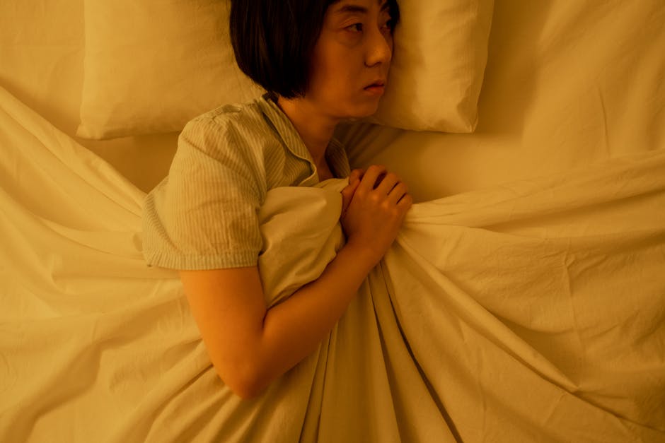 japanese man bedroom alone evening dim light tired