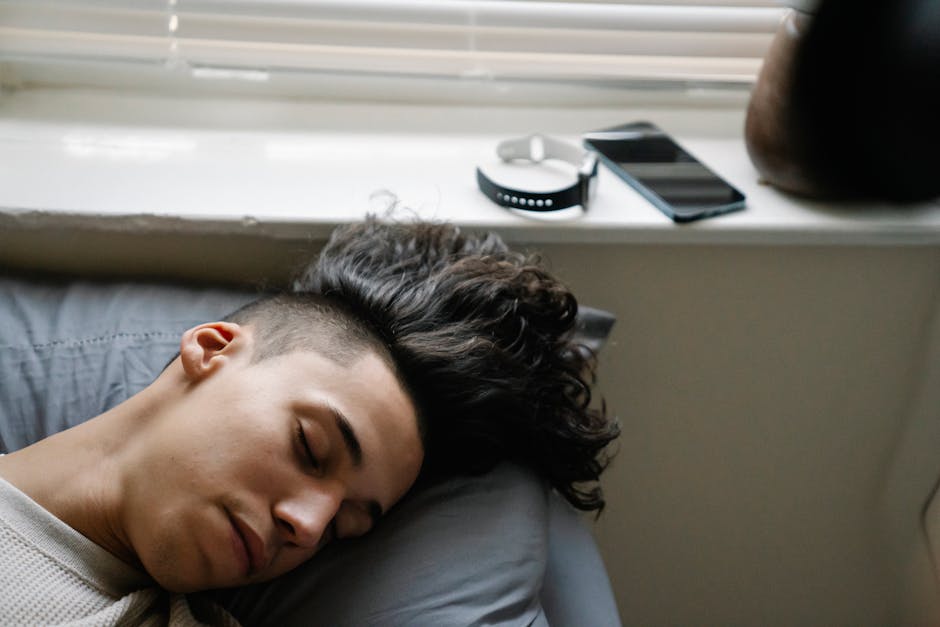 japanese man bedroom morning sleep data smartphone
